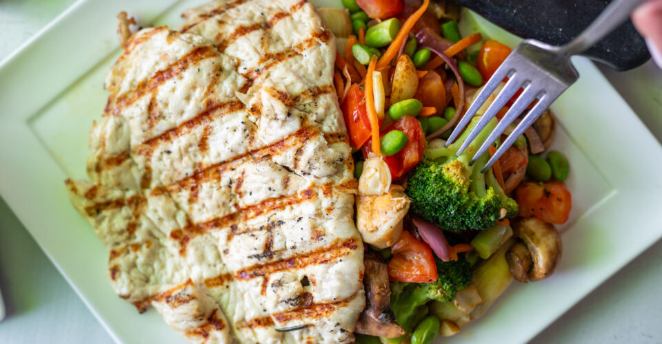 thinly pounded grilled chicken breast, extra virgin olive oil, sauteed garlic rainbow mixed vegetables